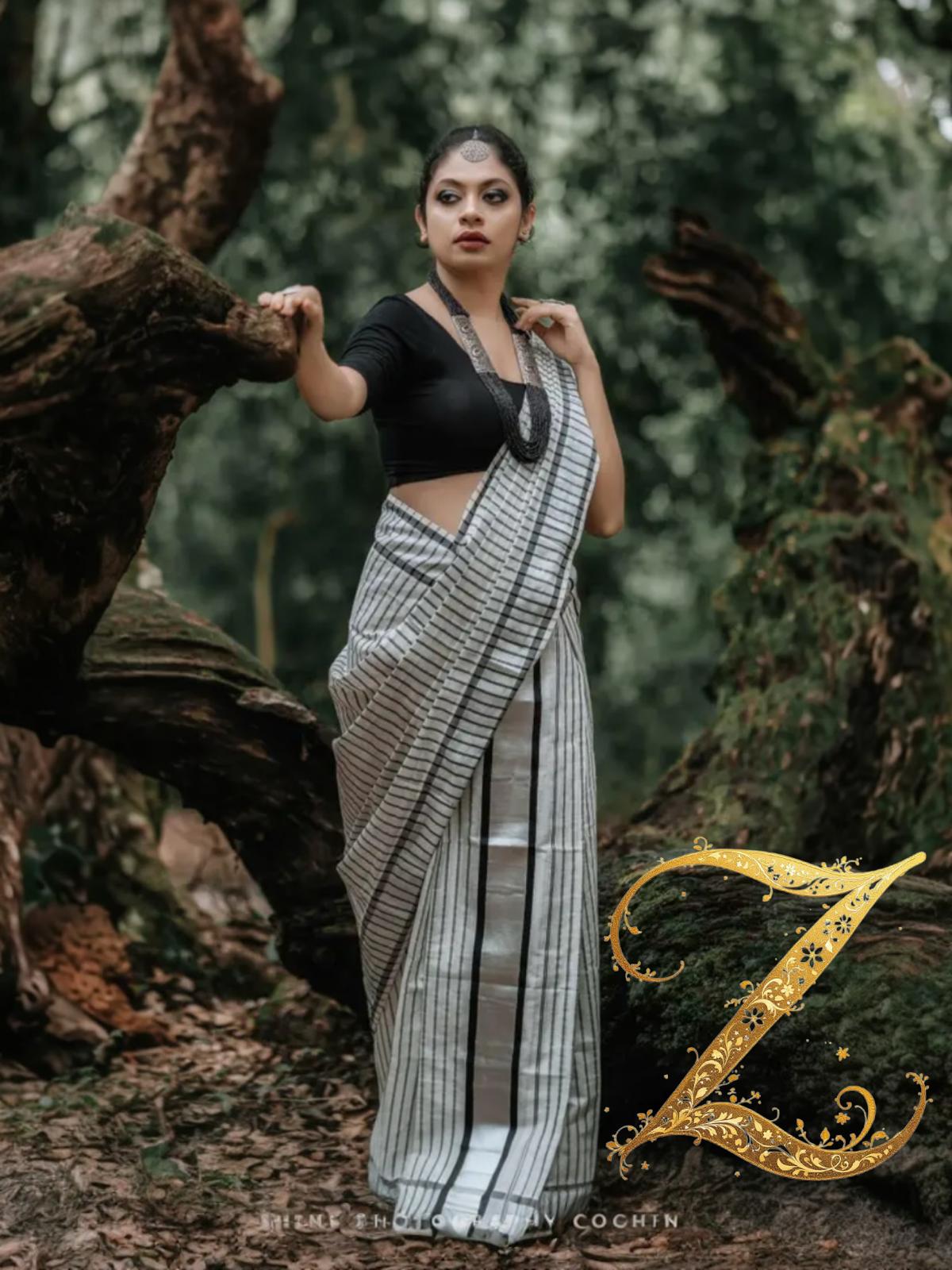 Silver tissue black lined set mundu
