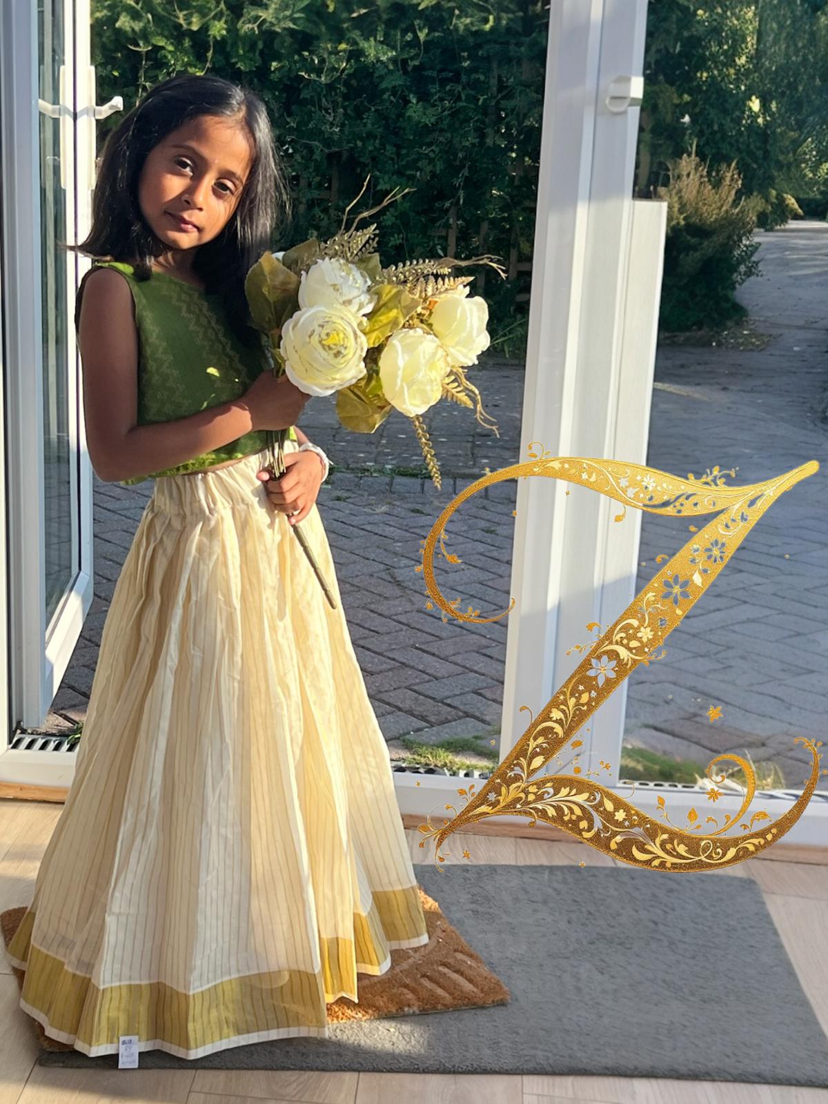 Kids Pattupavada with Pale Green Brocade Blouse