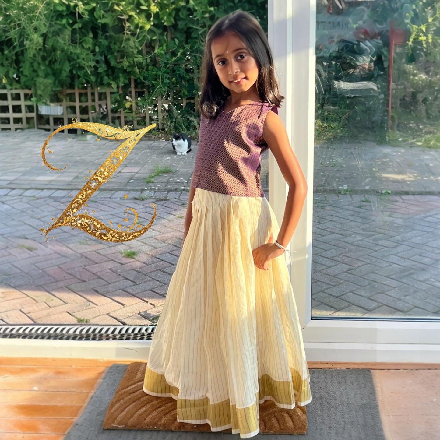 Kids Pattupavada with Purple Brocade Blouse