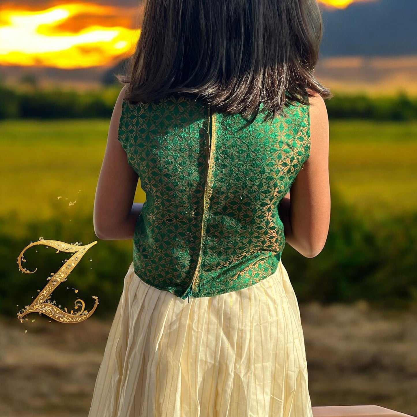 Kids Pattupavada with Purple, Green coloured Brocade Blouse